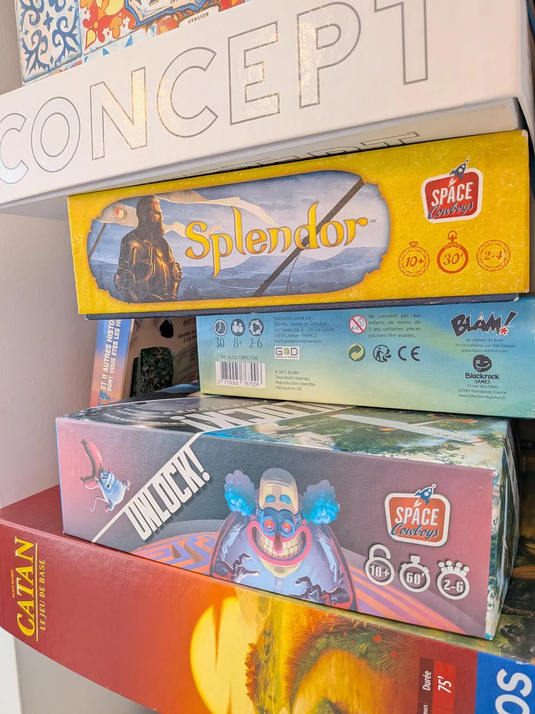Boîtes de jeux de société Concept, Splendor, Unlock et Catan